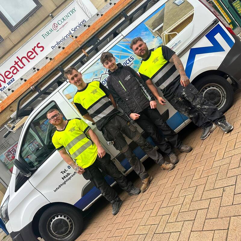 a picture of the roofers sheffield team standing in front their work van 